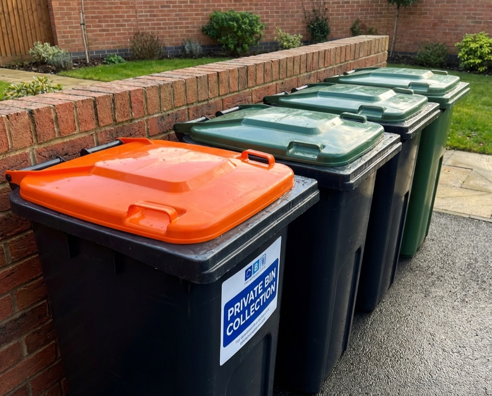 Recycling and general waste bins on a Chichester street